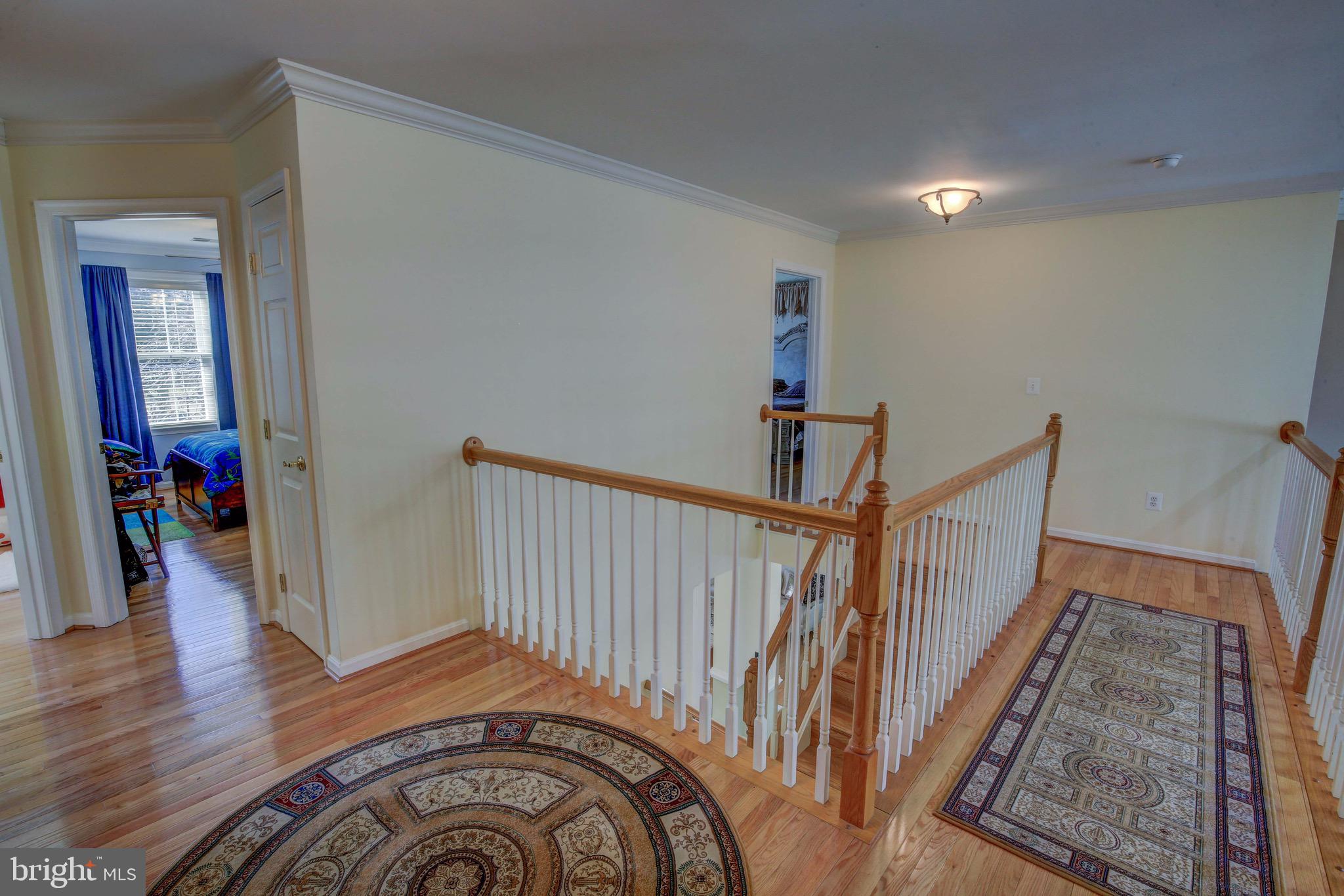 86 Jones Station Road Arnold, MD 21012 - Photo 39 of 42 Upstairs hallway open to the downstairs