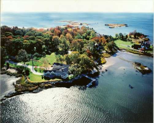 a view of a street with an ocean view