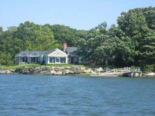 Undisclosed Address Darien, CT 06820 - Photo 2 of 7 a view of a house with a yard