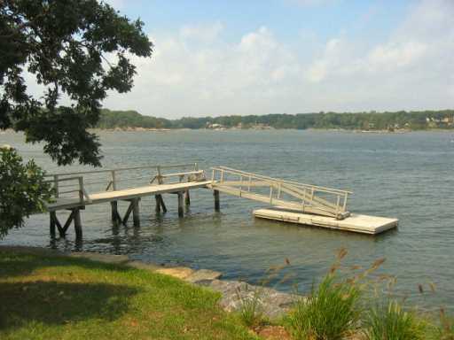 Undisclosed Address Darien, CT 06820 - Photo 6 of 7 a view of a lake with boats in it