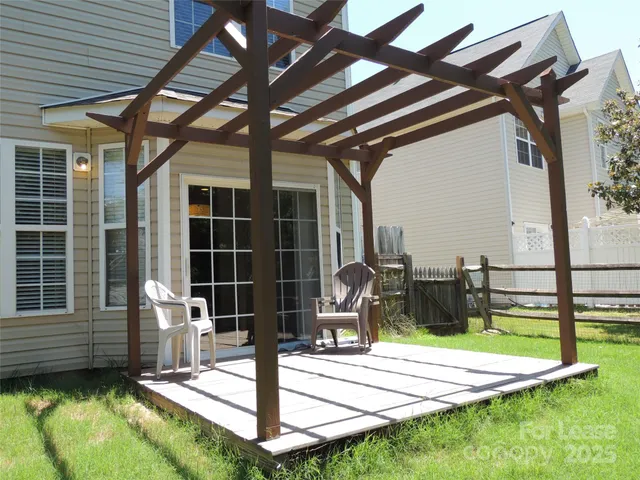 a view of swimming pool with seating space