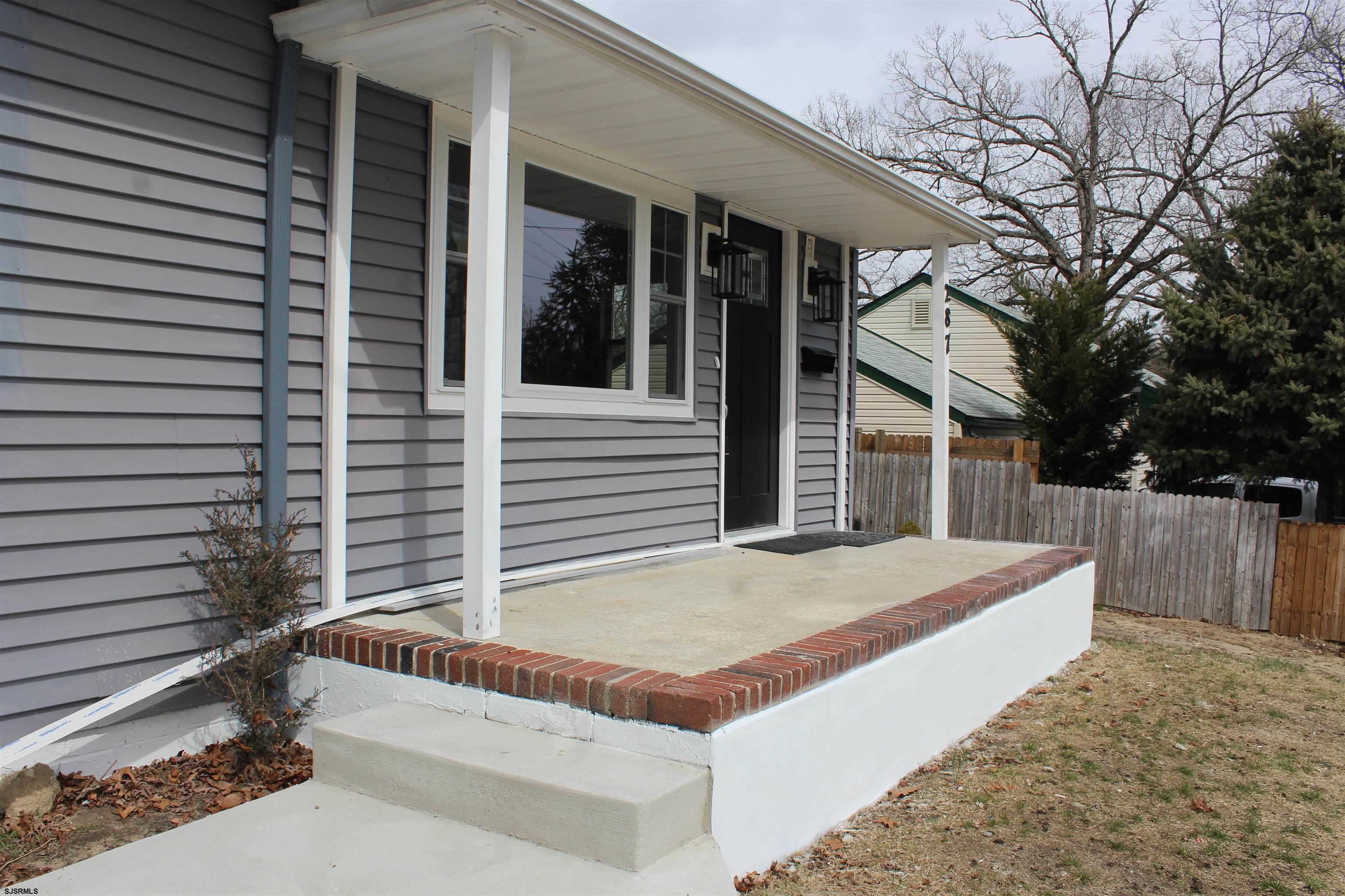 287 New Road Absecon, NJ 08201 - Photo 5 of 29 a view of house with backyard and tree