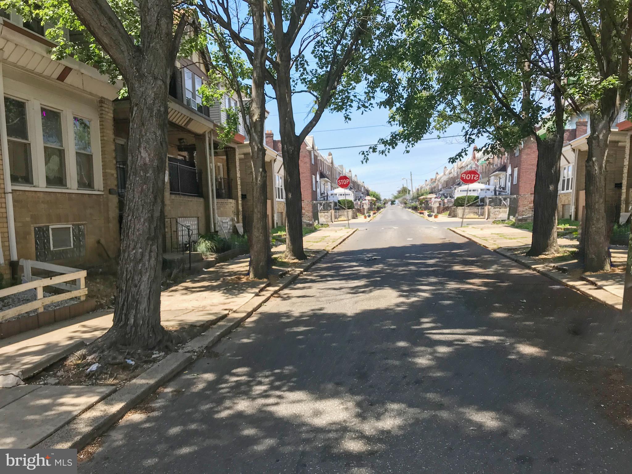 4613 Vista Street Philadelphia, PA 19136 - Photo 11 of 21 a view of a street with a tree on the road