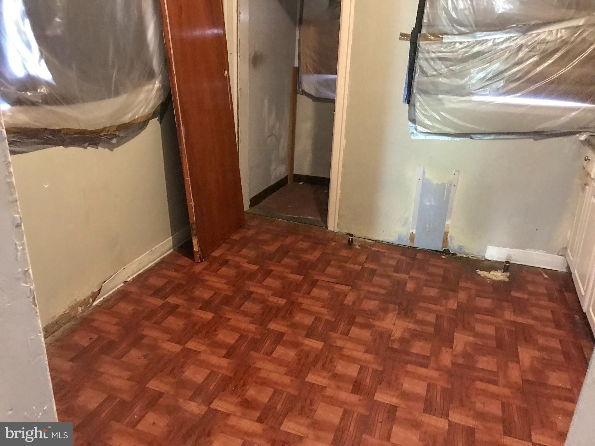 4613 Vista Street Philadelphia, PA 19136 - Photo 15 of 21 a bedroom with a bed and a mirror