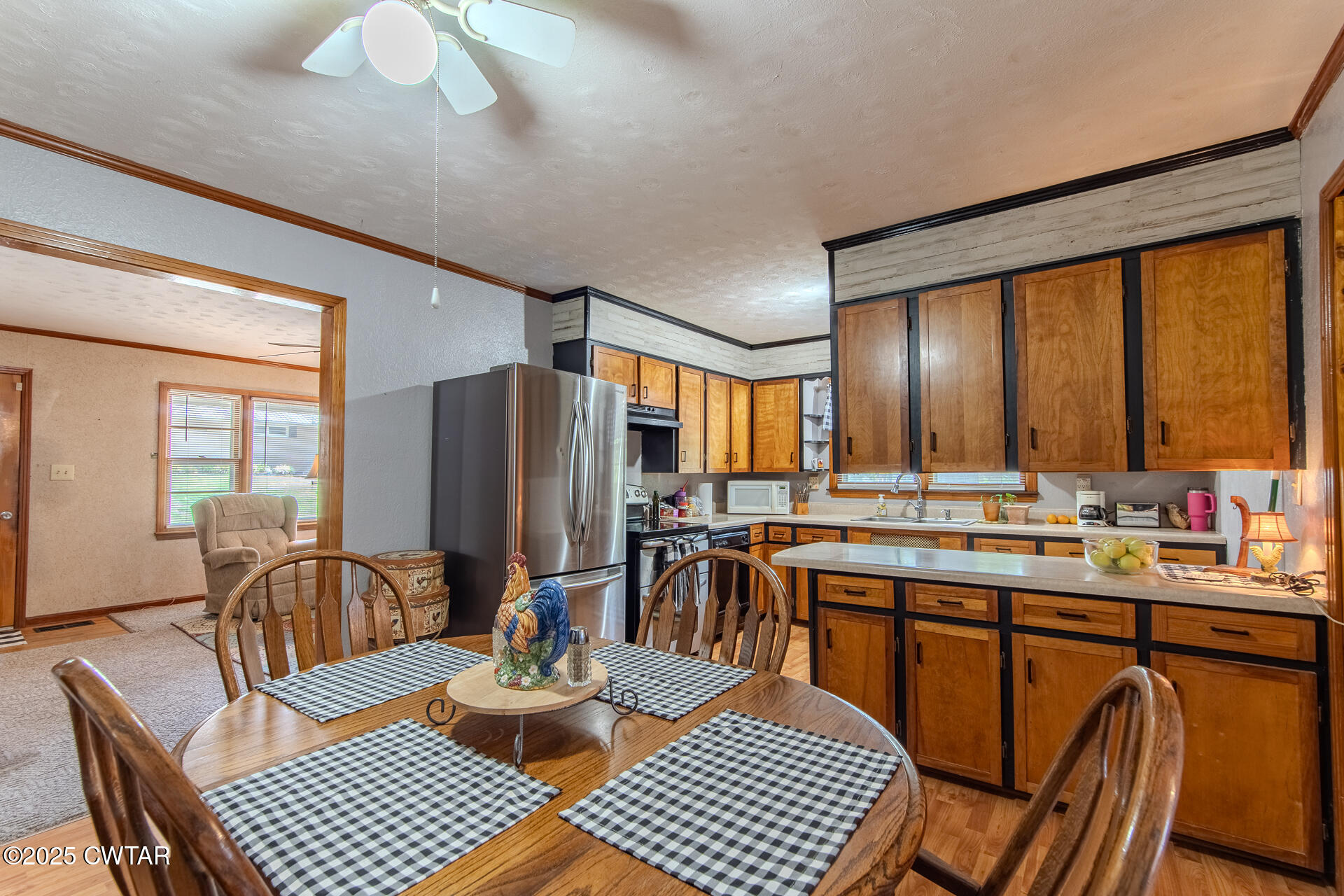 142 South Poplar Street Dyer, TN 38330 - Photo 7 of 28 a view of a dining room with furniture window and outside view