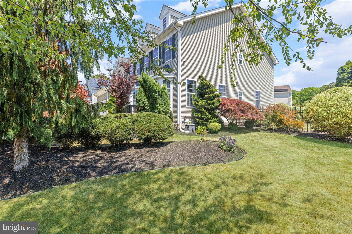 2650 Valhalla Road Vineland, NJ 08361 - Photo 44 of 49 a view of a backyard with plants and large trees