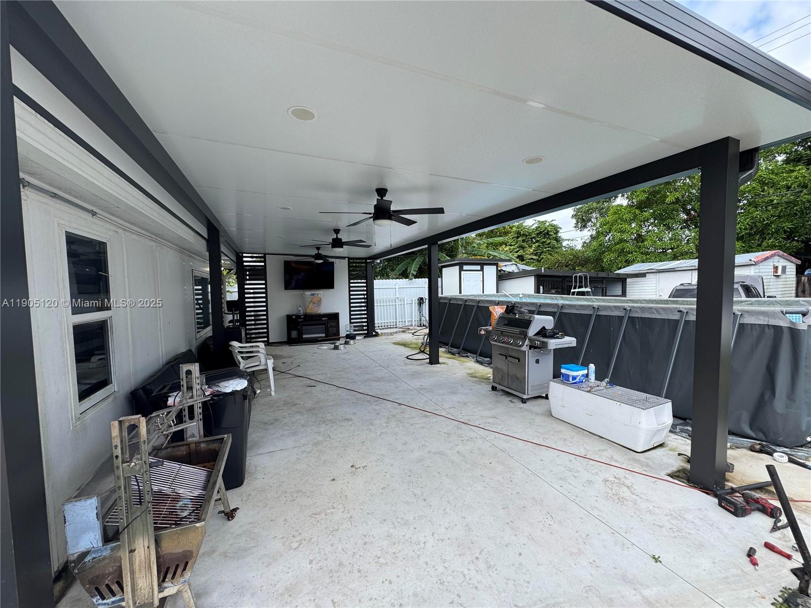 879 East 28th Street, Unit 879 Hialeah, FL 33013 - Photo 11 of 12 a view of a room with gym equipment