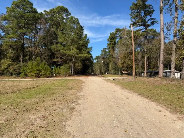 a view of road with trees