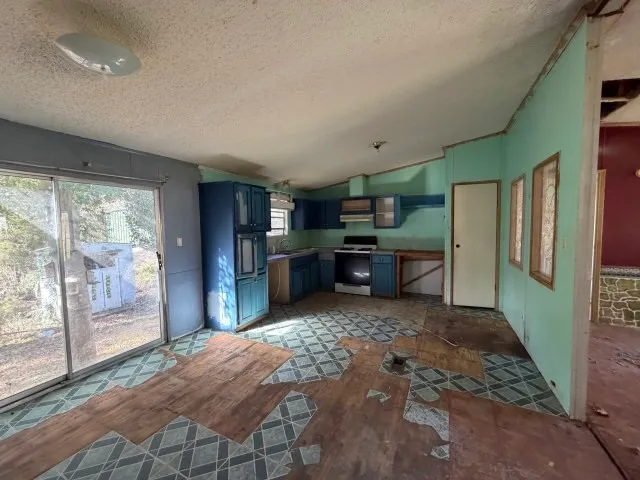 a room with furniture and a flat screen tv