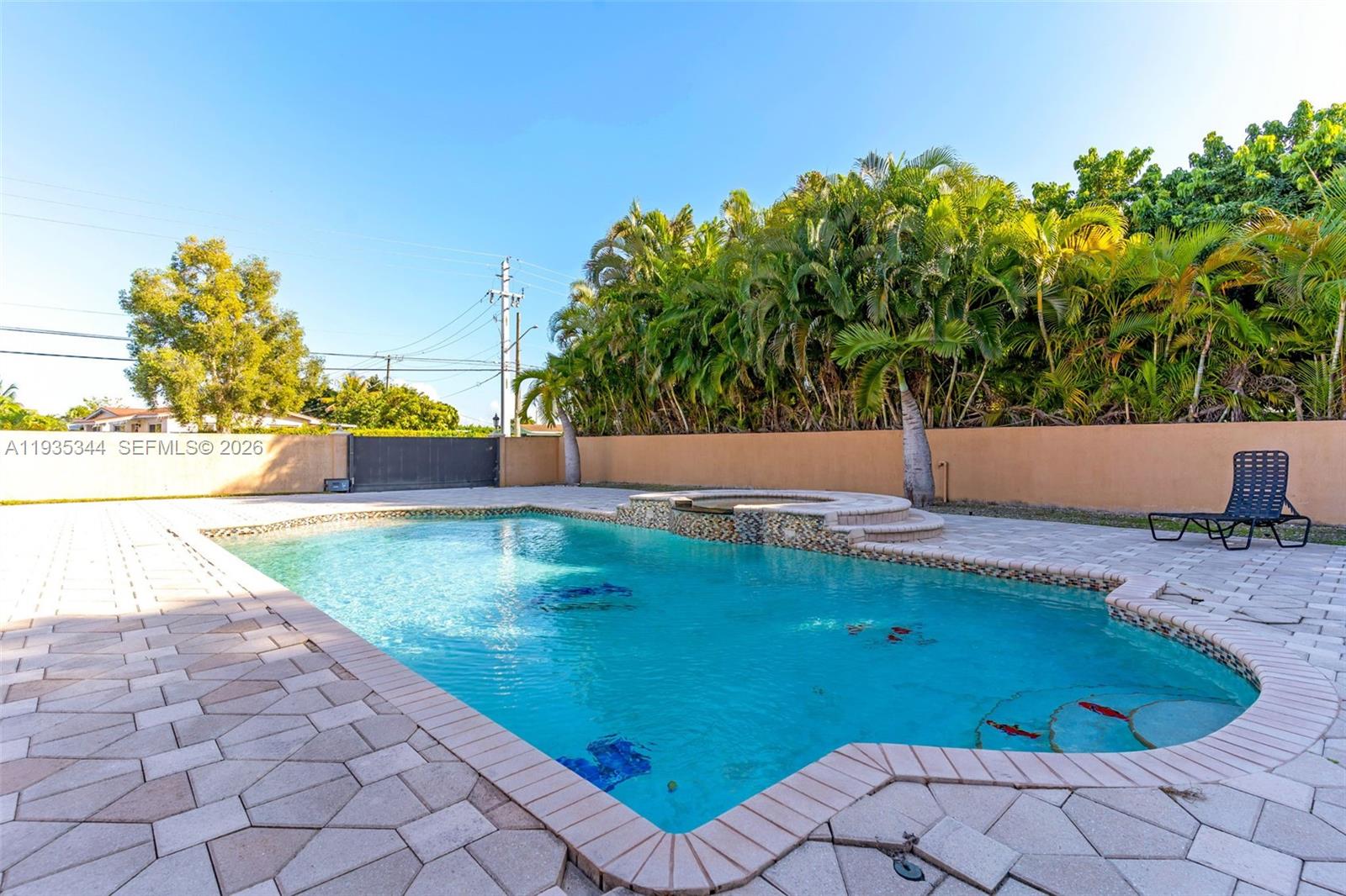 12700 Southwest 188th Street Miami, FL 33177 - Photo 34 of 44 a view of a backyard