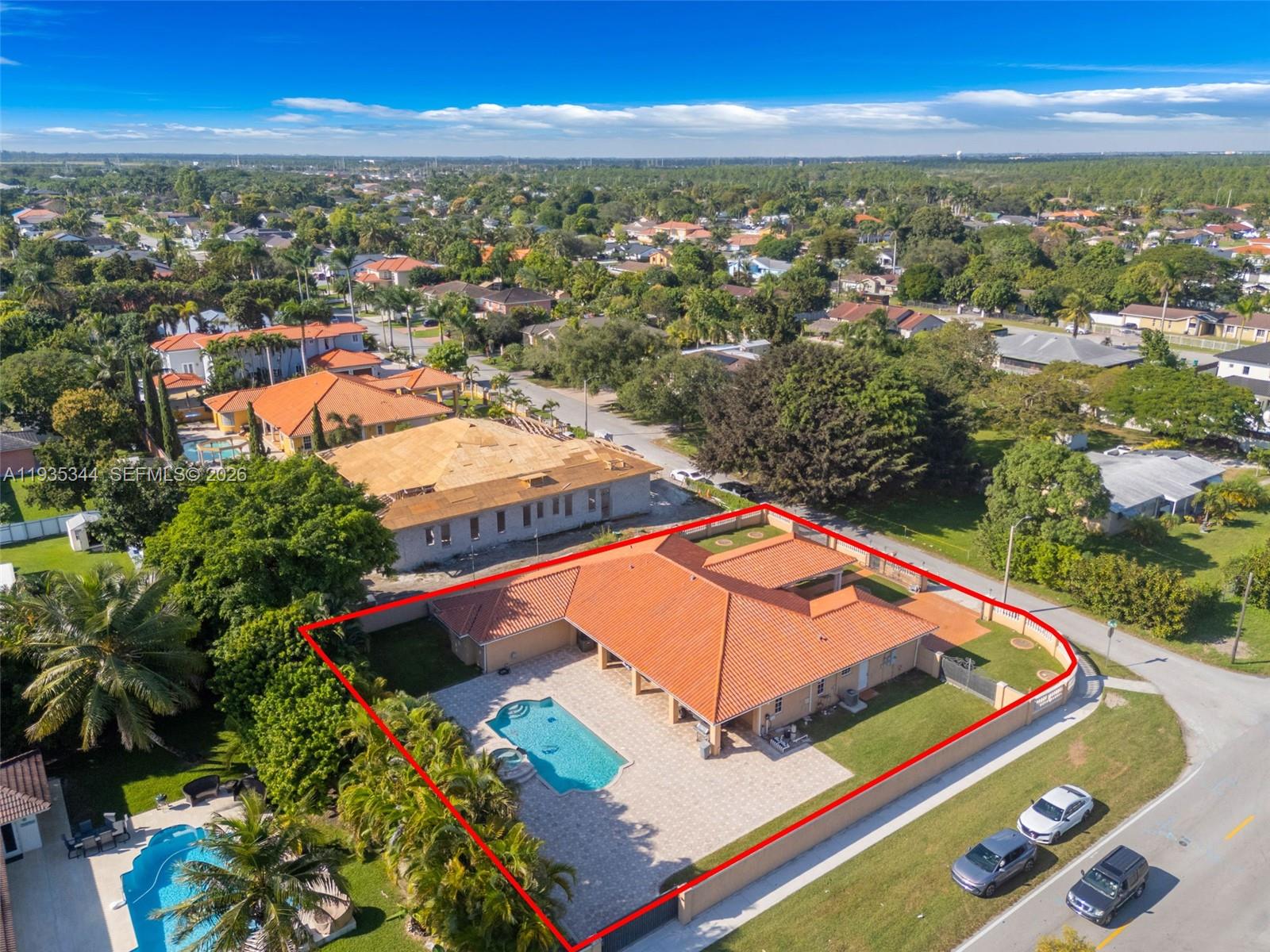 12700 Southwest 188th Street Miami, FL 33177 - Photo 42 of 44 an aerial view of residential houses with outdoor space