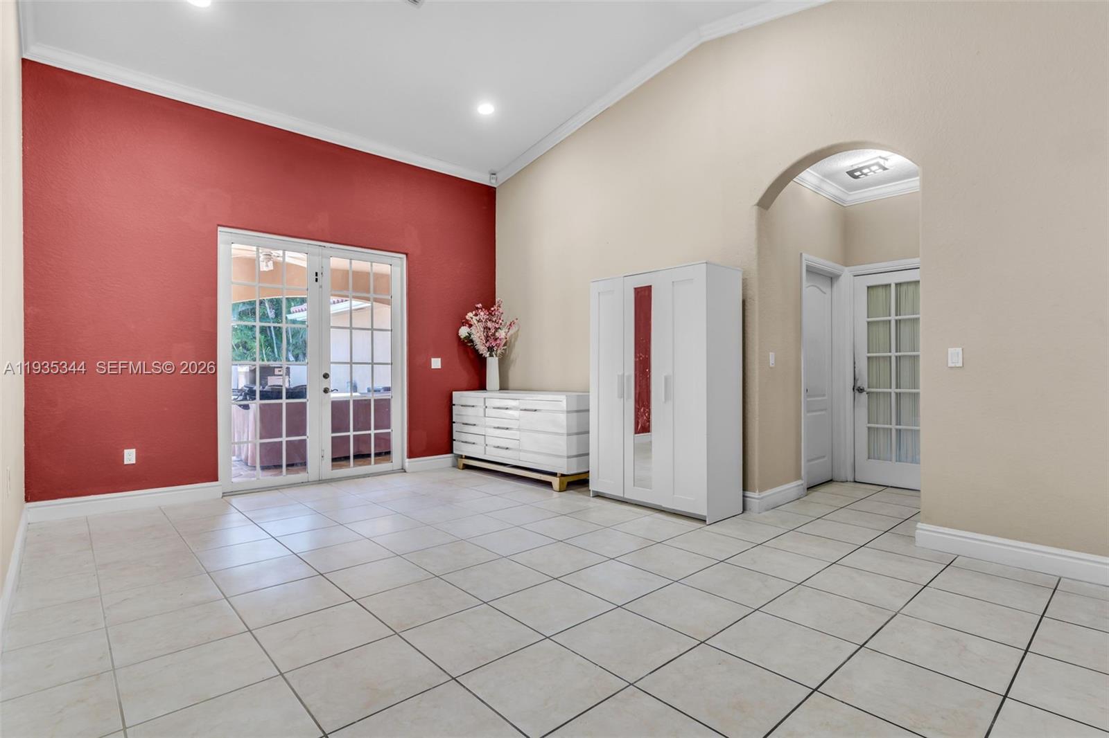 12700 Southwest 188th Street Miami, FL 33177 - Photo 6 of 44 a view of a livingroom with a chandelier