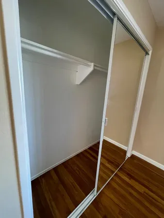 a view of an empty walk in closet