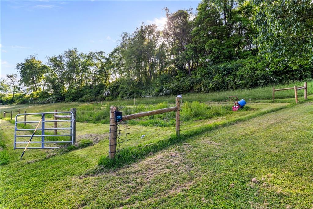 967 Good Intent Road Claysville, PA 15323 - Photo 39 of 50 a green field with lots of trees in the background
