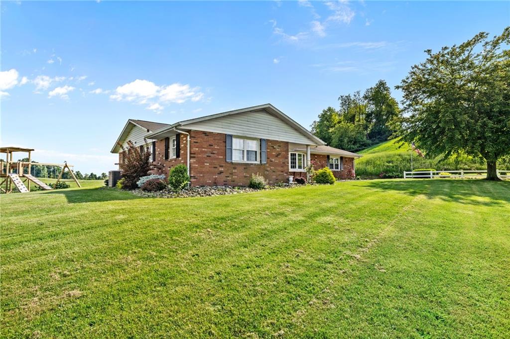 967 Good Intent Road Claysville, PA 15323 - Photo 4 of 50 a front view of house with yard and green space