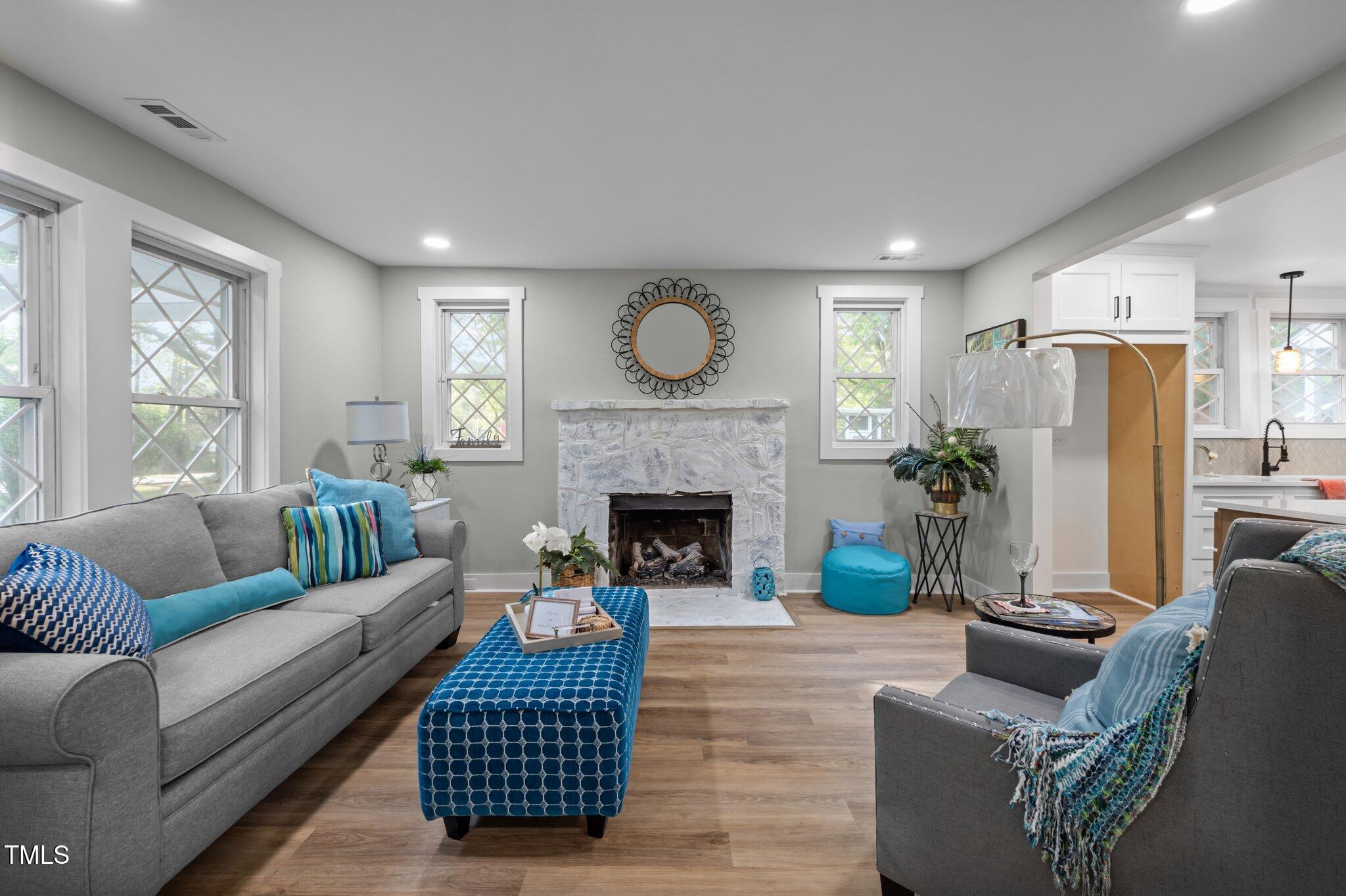 3014 Hope Valley Road Durham, NC 27707 - Photo 5 of 38 a living room with furniture and a fireplace