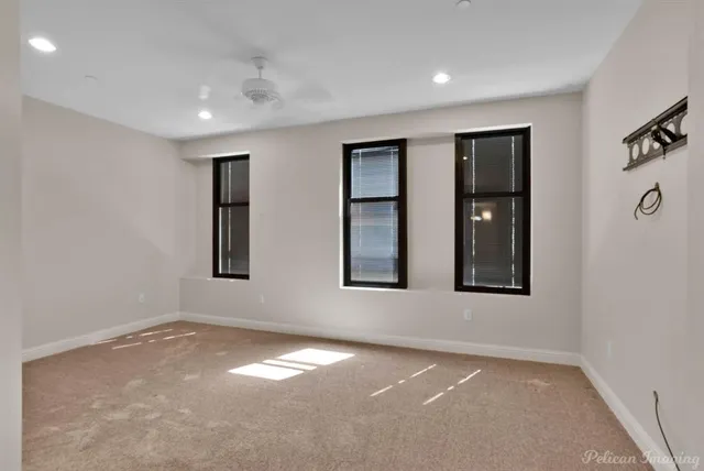 an empty room with windows