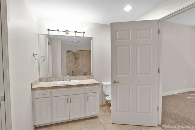 a bathroom with a tub and a shower
