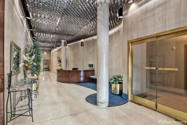 a view of a balcony with wooden floor