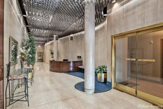 a view of a balcony with wooden floor