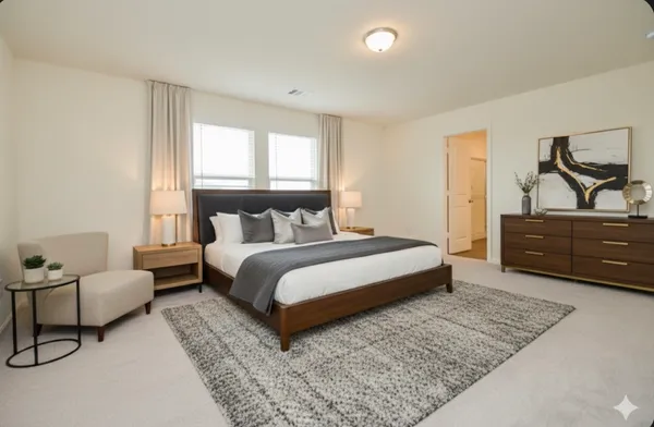 a bedroom with a bed and window