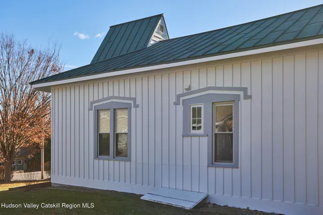 a front view of a house with a porch