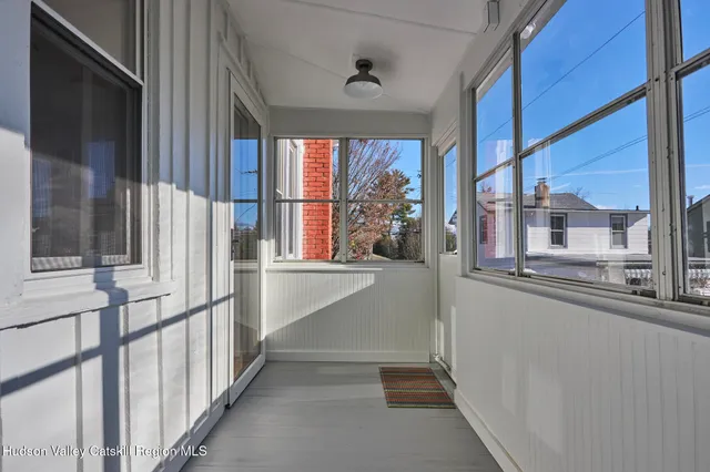 a view of a room with a large window