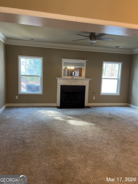 10 Winged Foot Way Southeast Covington, GA 30014 - Photo 12 of 12 an empty room with a fireplace and windows