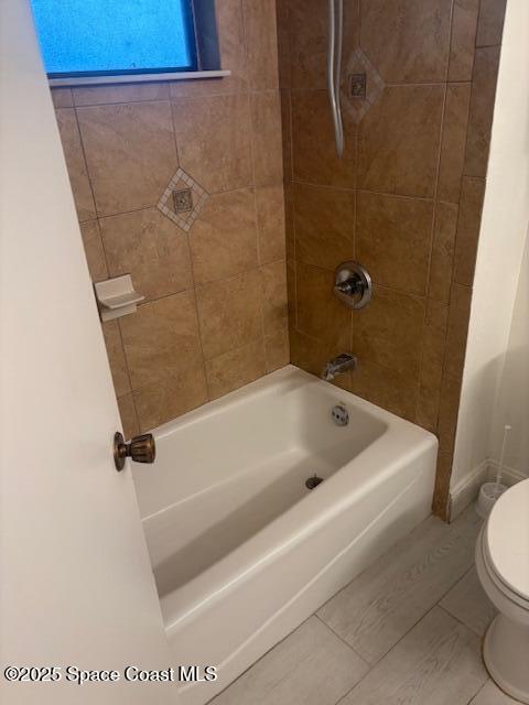 1140 Riviera Drive Northeast Palm Bay, FL 32905 - Photo 10 of 10 a bath tub sitting next to a white toilet and a shower