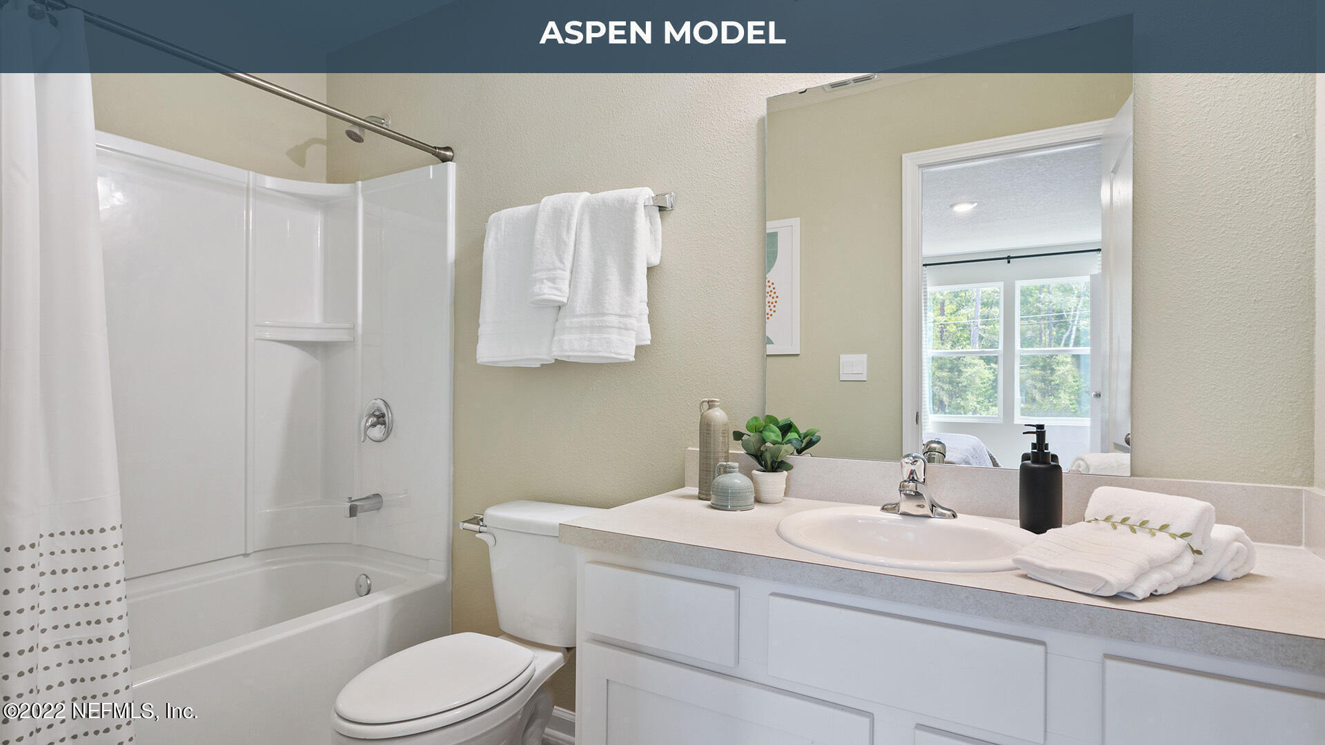 65 Blue Hvn Road St. Augustine, FL 32095 - Photo 20 of 57 a bathroom with a granite countertop sink a toilet and bathtub