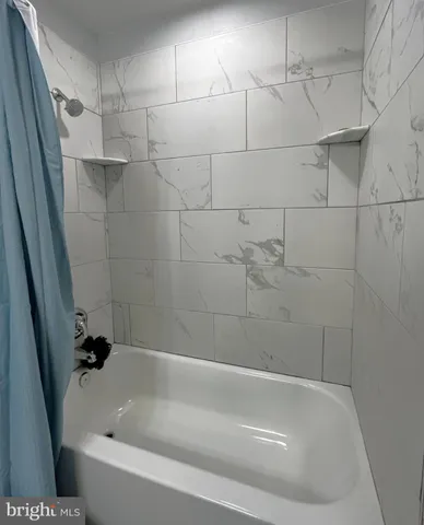 a bathroom with a bathtub