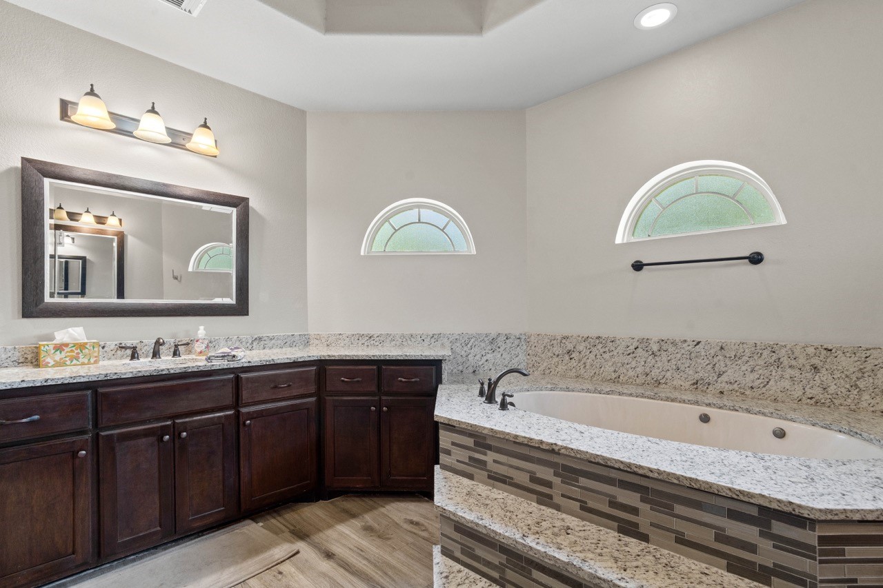 27585 Rio Blanco Drive Splendora, TX 77372 - Photo 23 of 39 Offering double and separate sinks you will each have your own space and room!