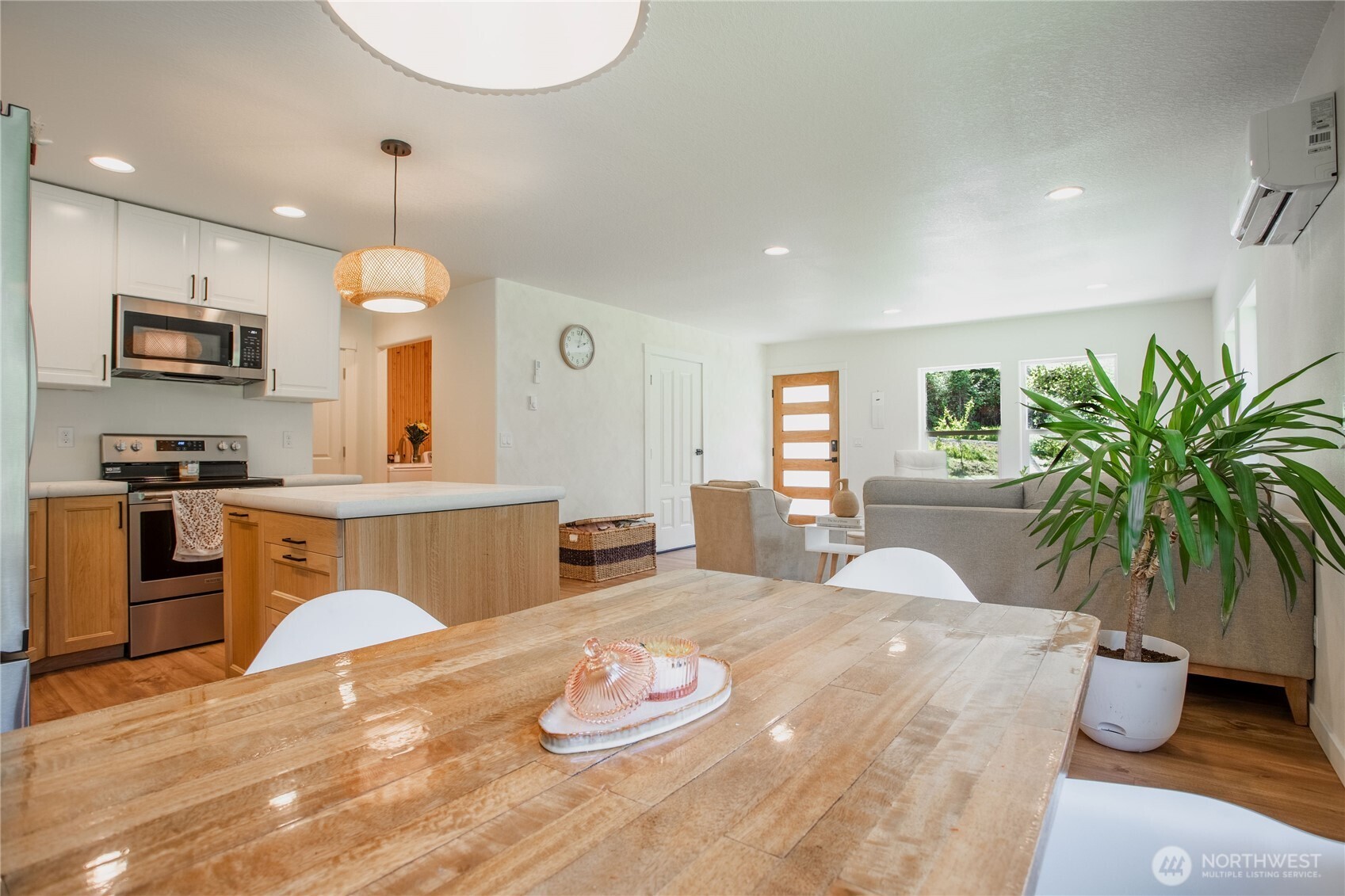 111 Eadon Road Toledo, WA 98591 - Photo 10 of 32 a kitchen with stainless steel appliances granite countertop a refrigerator a sink a stove and a wooden floors