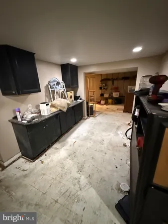 a bed room with furniture and a flat screen tv