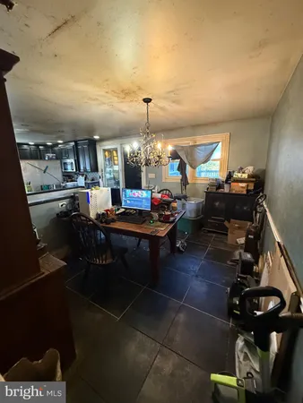 a living room with lots of furniture and decor