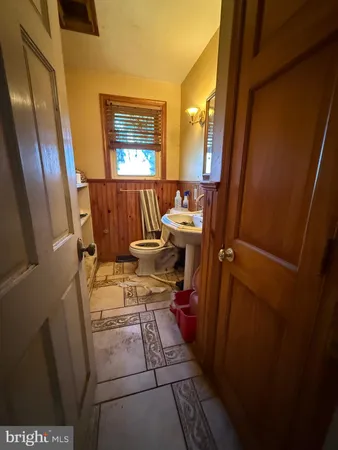 a view of living room with furniture and window