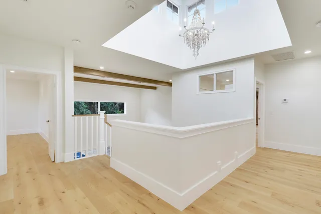 a view of a bedroom with closet and bathroom