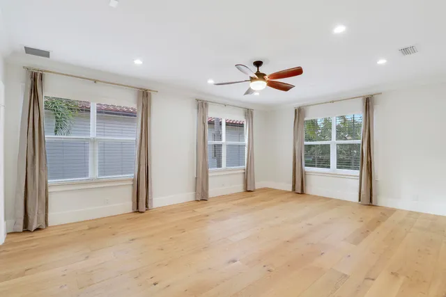 a bathroom with a double vanity sink mirror and
