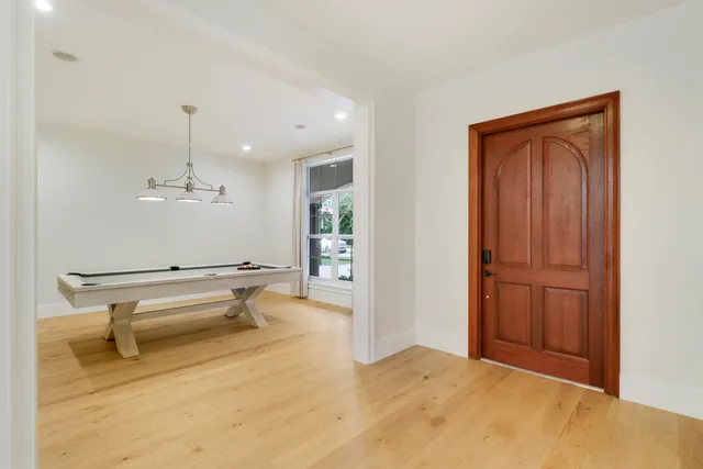 a room with cabinets and window