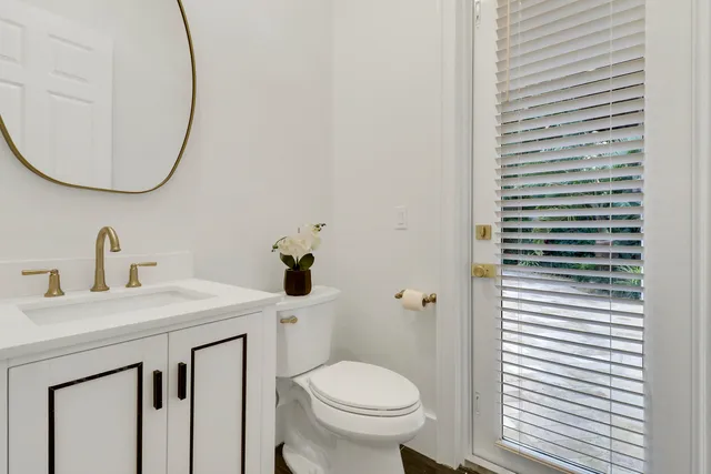 a view of a swimming pool with a patio and yard