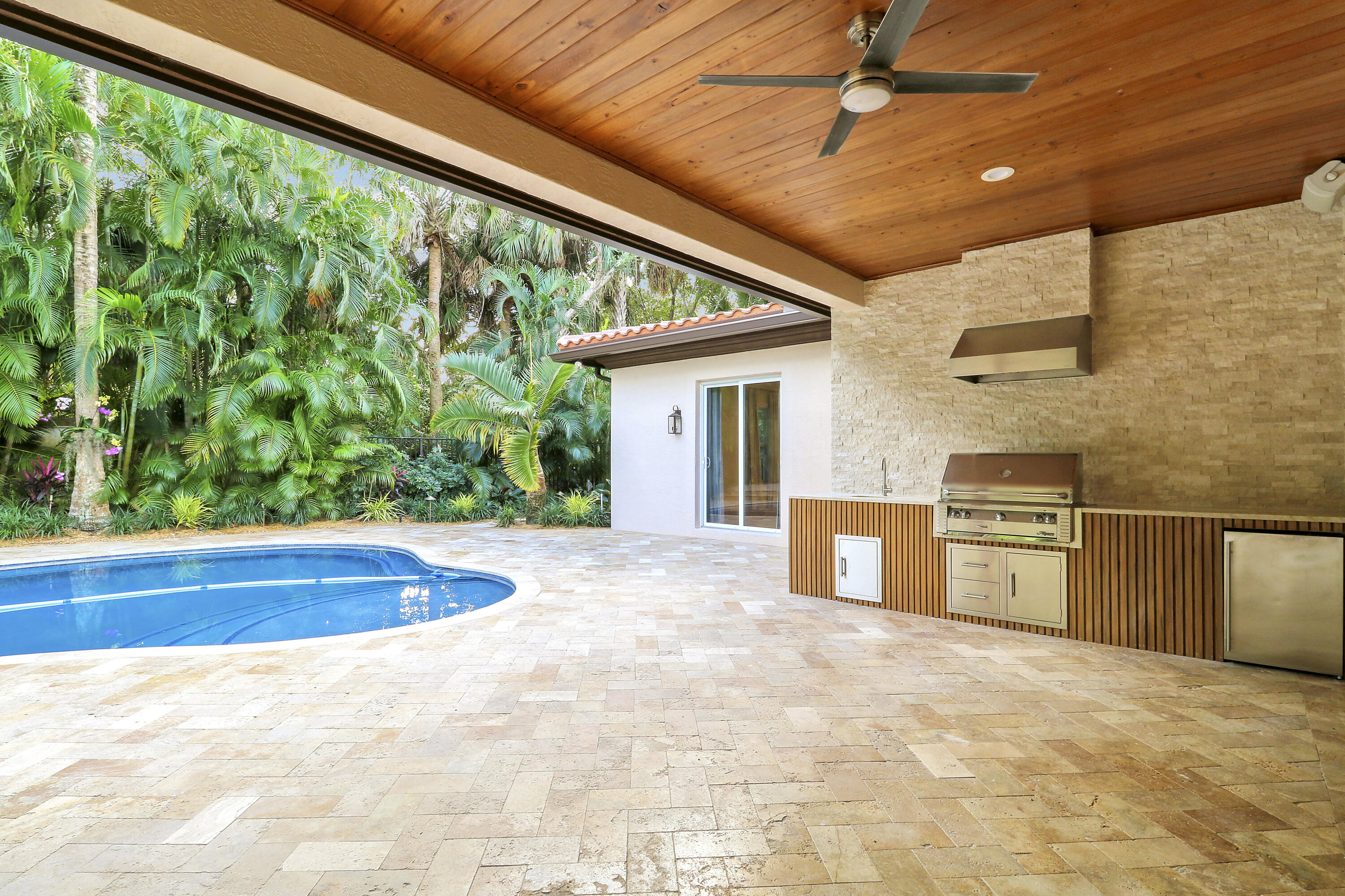 142 Segovia Way Jupiter, FL 33458 - Photo 44 of 52 Covered Porch and Outdoor Kitchen