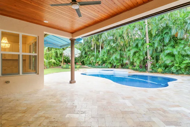 a view of a house with swimming pool