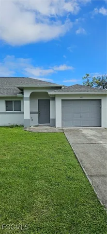 a house view with a garden space