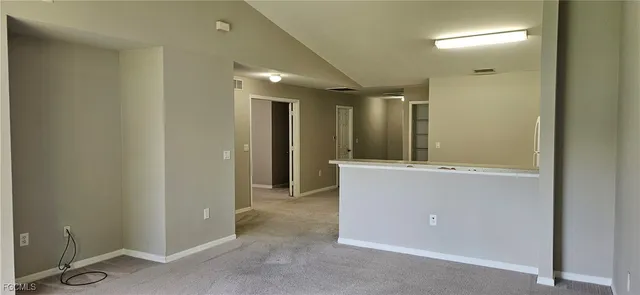 a view of a hallway with entryway