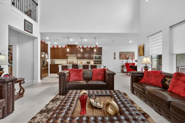 a living room with furniture and a rug