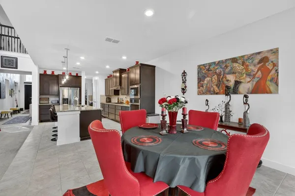 a view of a dining room with furniture