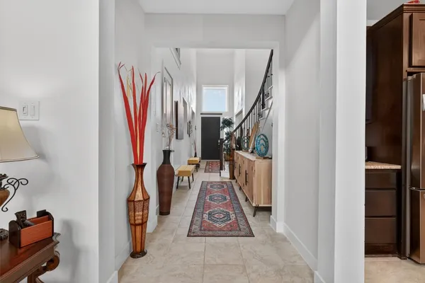 a view of a hallway with closet