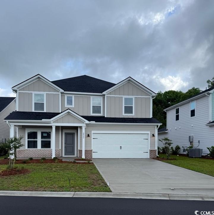 2044 Copper Crk Loop Longs, SC 29568 - Photo 1 of 39 Craftsman inspired home with brick siding, central