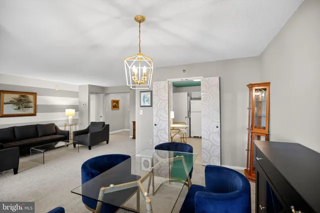 a view of a livingroom with furniture and window