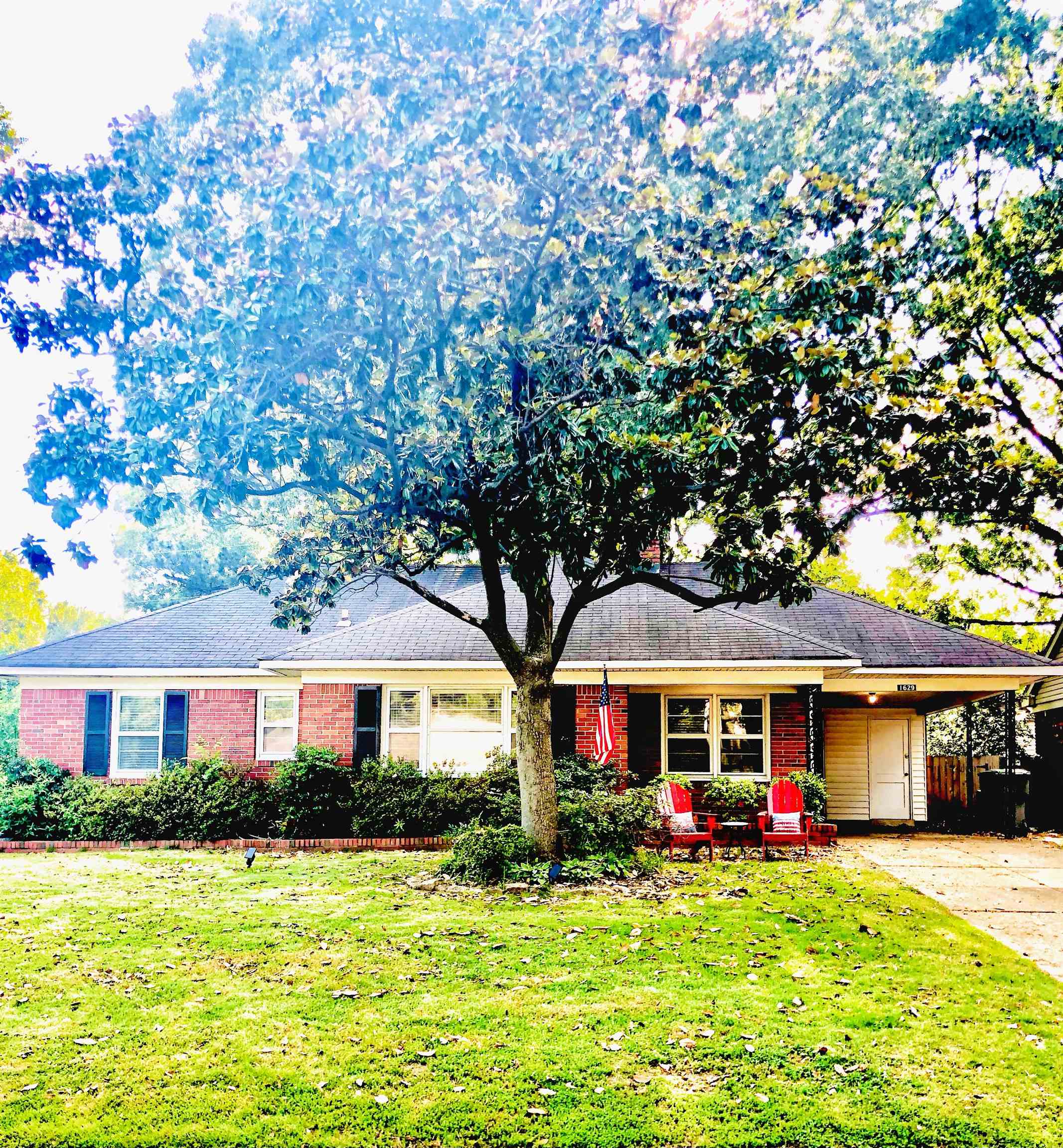 1629 Rabb Road Memphis, TN 38119 - Photo 1 of 21 a front view of a house with porch